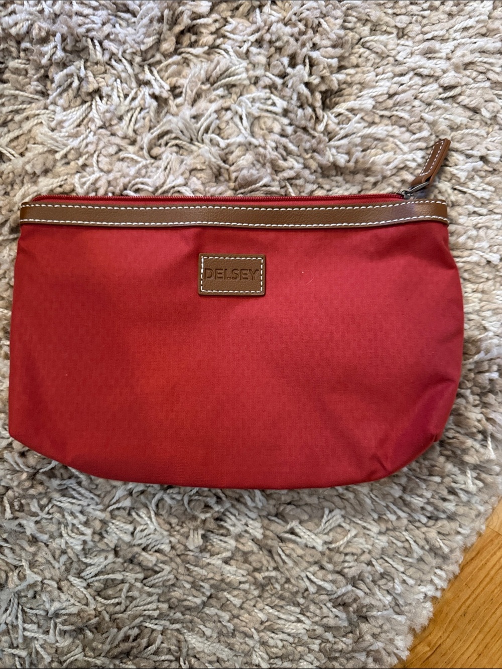 Delsey Red Cosmetic Pouch with Brown Trim